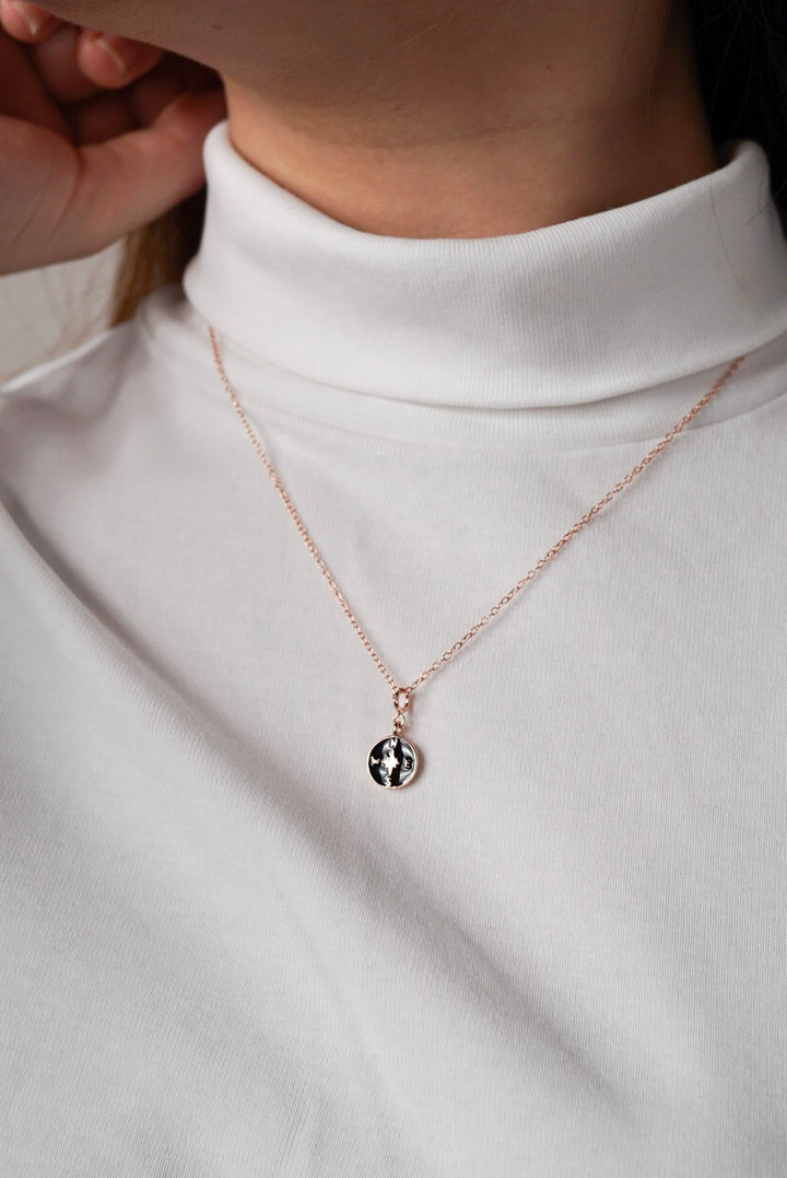 Rose gold compass necklace