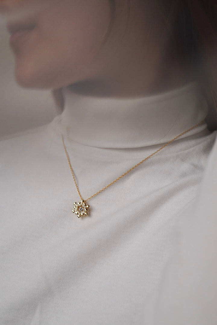 Gold Dancing Diamond Snowflake Necklace